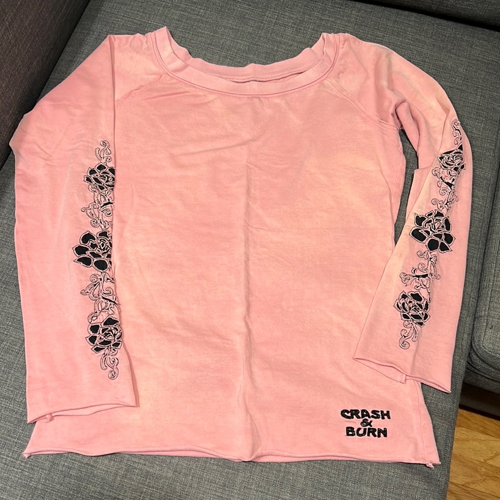 Woman’s embellished sweatshirt top from Crash and Burn